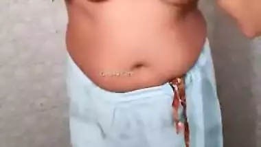 Desi woman puts on clothes but XXX hubby looks for a moment to have sex