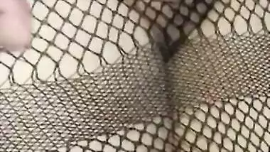 Hot Desi babe in fishnet dress has her pussy XXX rubbed by lover