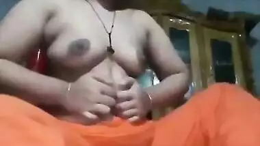 XXX Indian babe sticks tongue out and plays with her sex parts on camera