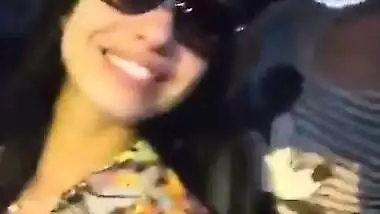 Two hot babes flash there boobs and kiss each other in moving car..