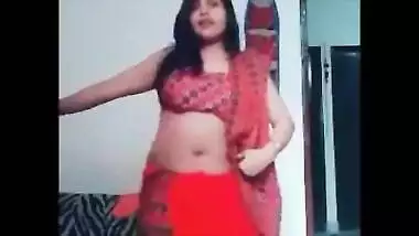 Female performs an Indian sex belly dance in a XXX manner on camera