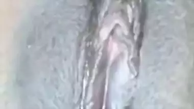 Amateur Desi gal shows she is ready for sex by touching bald XXX twat