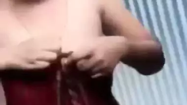 Slutty teen gal exposes perky Desi tits and cute twat in XXX clip