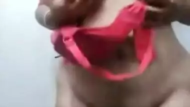 Desi wife performs a sex show flashing her XXX sized boobs on camera