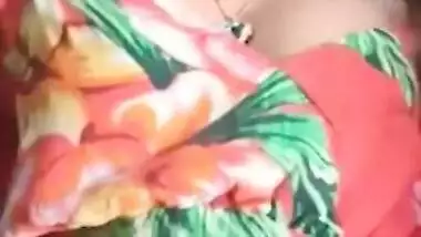 Staggering Desi porn girl in floral dress climbs the glass table