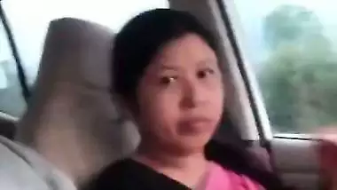 Cute Assamese wife blowjob to husband in running car