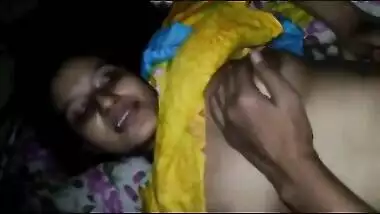 Guy touches Indian babe's boobs having oral sex in front of the camera