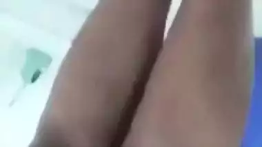 Beautiful desi girl lifting top to reveal sexy boobs