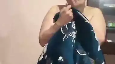 Nude milf exposes her big boobs in front of her son-in-law