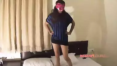Indian girl with red mask takes XXX poses to tempt young man into sex