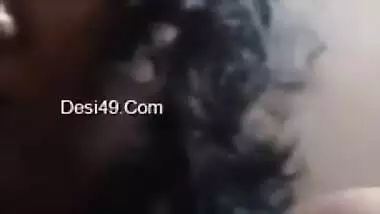 Desi mom with serious face sits before camera topless in solo sex clip